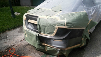 Vehicle masked and prepped for paint repair