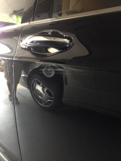 Scratch and dent repair on a car door